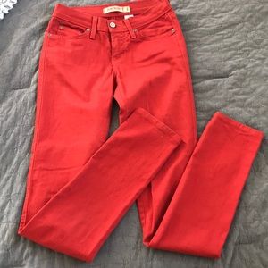 Brick red jean pants